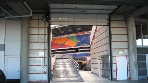 Fire resistant fireproof vertical sliding door in a stadium