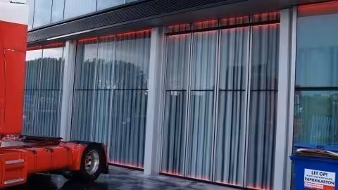 Special Glass sectional doors in the flush façade of theater de Kom