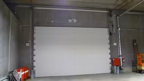Sound insulating overheaddoors - Copenhagen Arena - Protec Industrial Doors