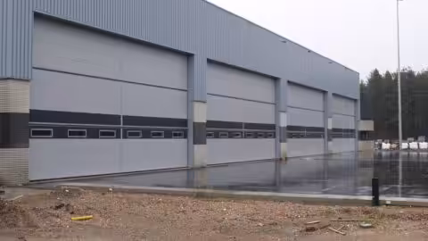 Burglar-Resistant Hangar Doors – Protec Industrial Doors Image of a burglar-resistant hangar door designed for high-security applications, provided by Protec Industrial Doors