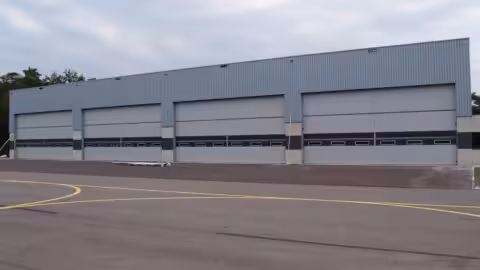 Large Burglar-Resistant Overhead Doors – Protec Industrial Doors Image of a large burglar-resistant overhead door designed for high-security applications, provided by Protec Industrial Doors